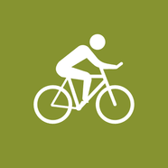 Symbol eines Radfahrers auf grünem Hintergrund.