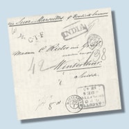 Historischer Briefumschlag mit handgeschriebenen Notizen und Stempeln.