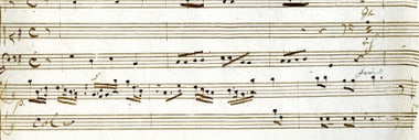 Handgeschriebene Partitur mit Noten und Text.
