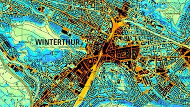 Farbige Karte einer Stadt mit Strassen und Gebäuden.