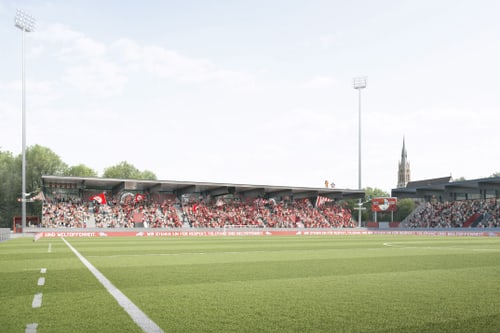 Fussballstadion mit Zuschauern auf den Tribünen.