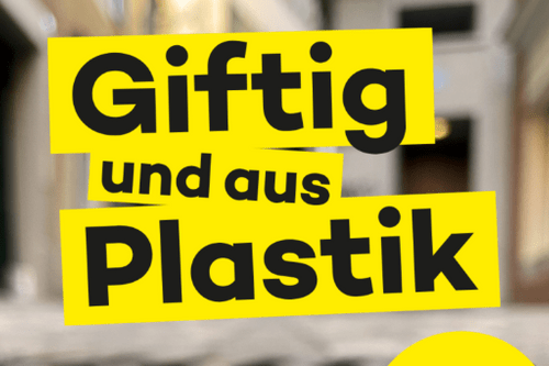Gelber Text auf einem unscharfen Stadtbild.