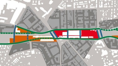 Stadtplan mit farbigen Bereichen und Strassen.