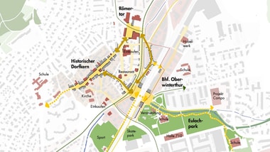 Stadtplan mit markierten Bereichen und Strassen.
