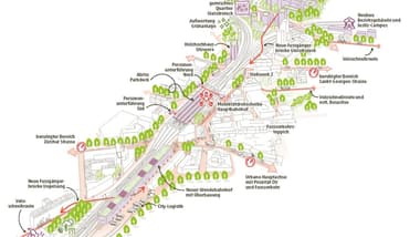 Stadtplan mit Gebäuden und Strassen, illustriert mit Symbolen und Text.